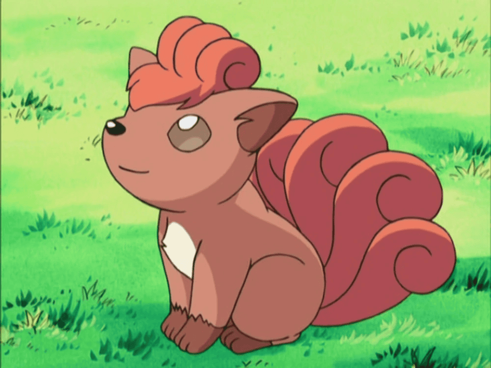 Vulpix, a fox-like Pokémon with multiple tails and expressive eyes