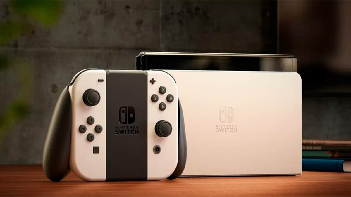 Nintendo Switch OLED console and a Joy-Con controller resting on a table