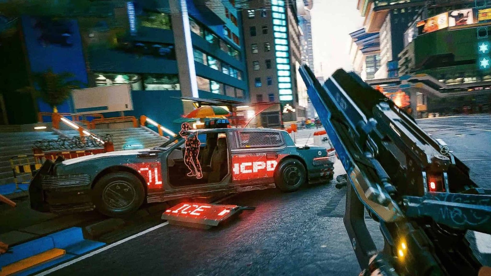 Neon-lit streets of Night City with towering megastructures