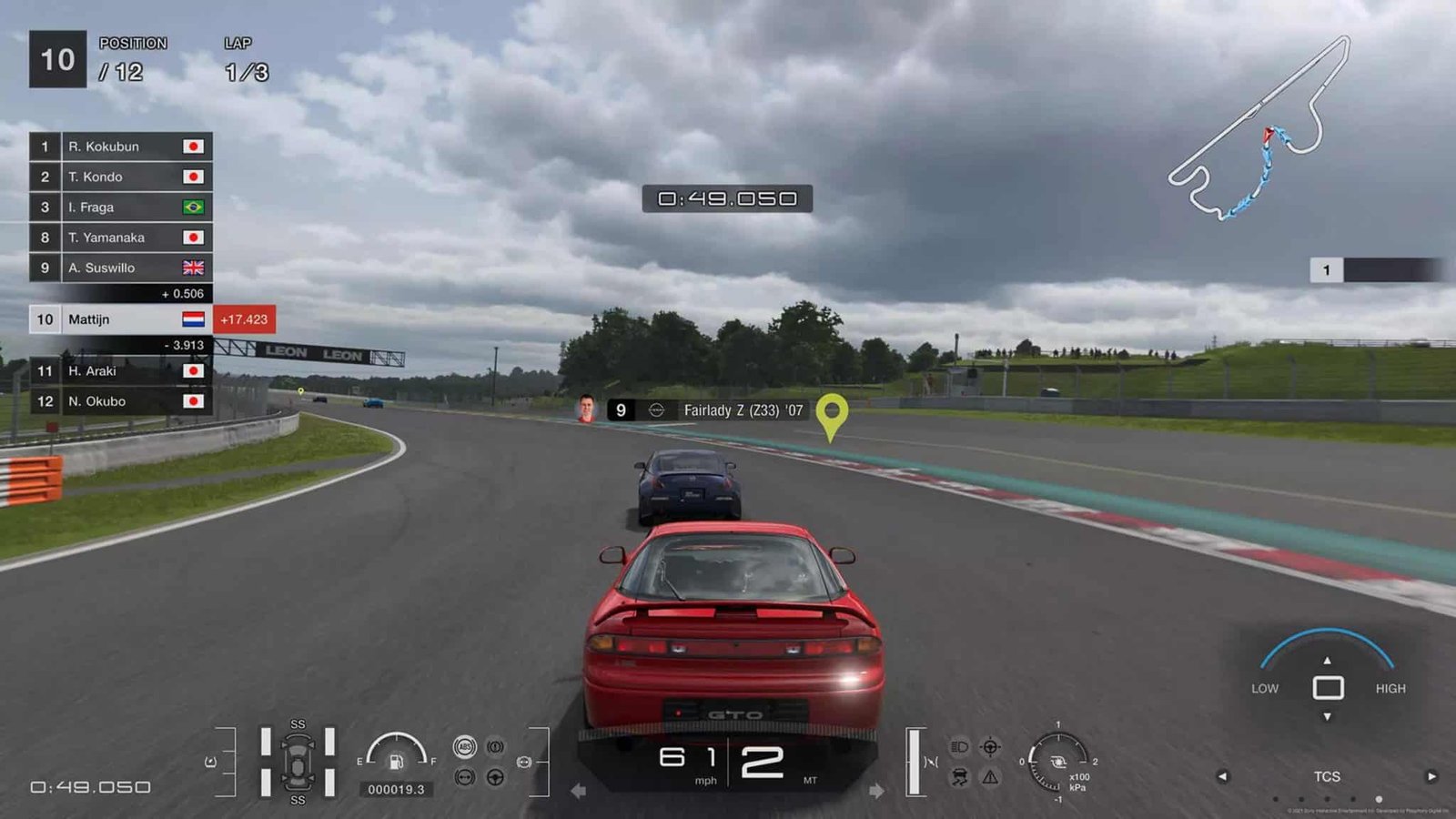 A close-up of a race car cockpit under dynamic lighting