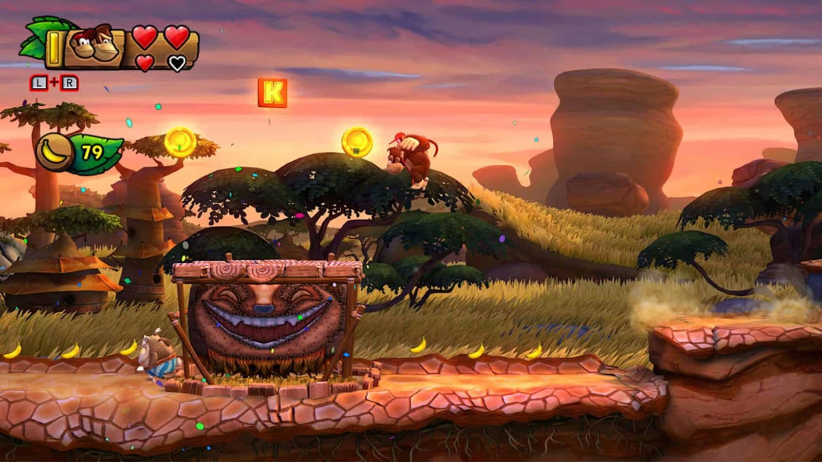 Donkey Kong and companions navigating a tropical level in Donkey Kong Country: Tropical Freeze
