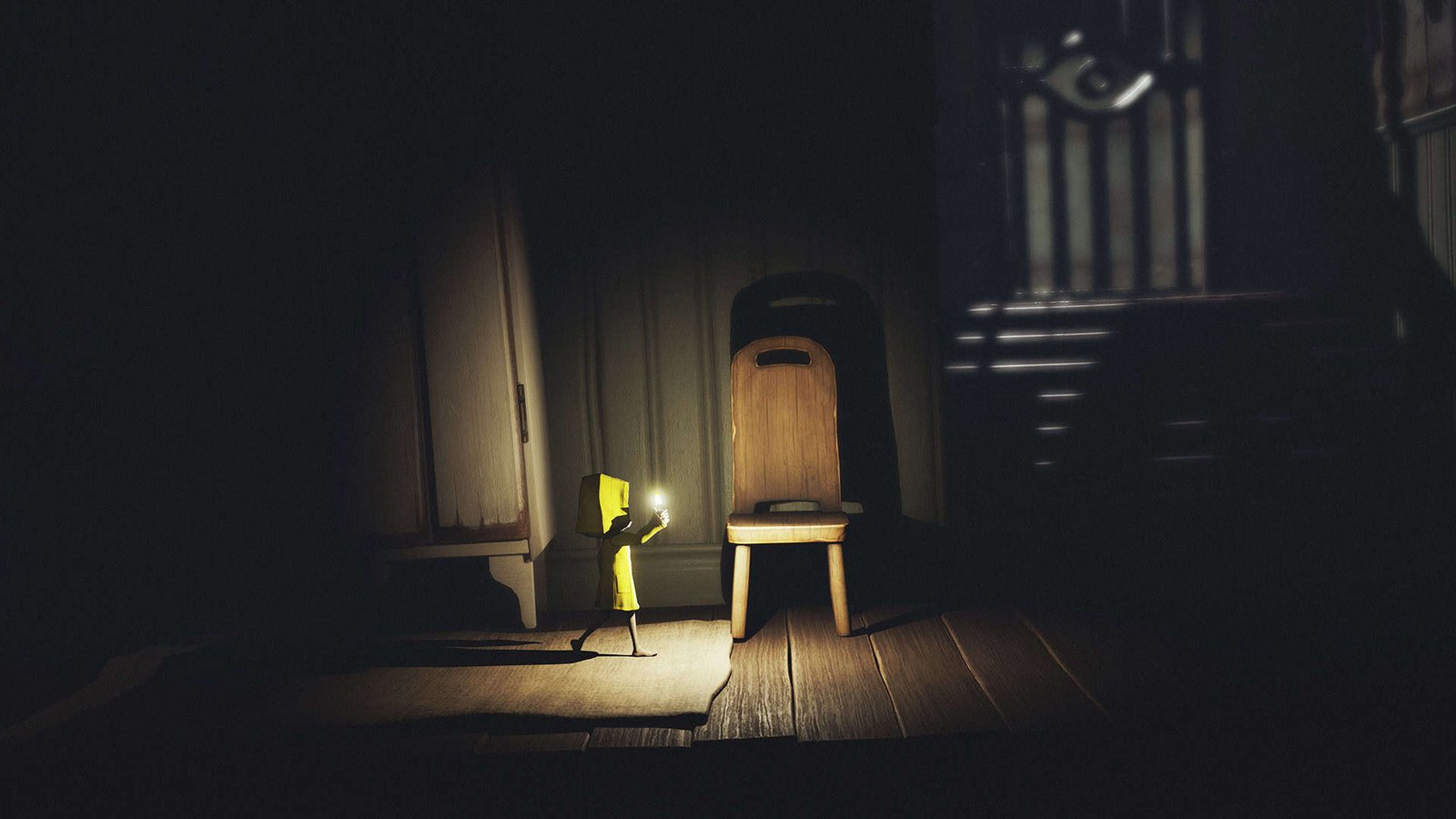 A small figure in a yellow raincoat hides aboard a frightening ship