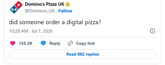 Social media screenshot showing Domino’s reply and user reactions