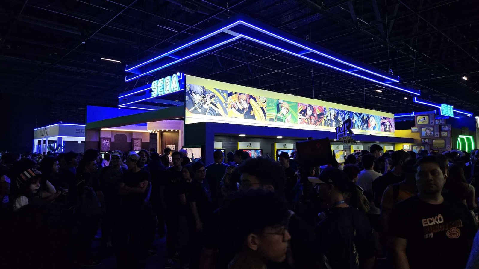 SEGA and Nintendo exhibition area with visitors testing upcoming games