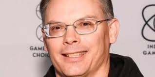 Tim Sweeney speaking at an event, portrait