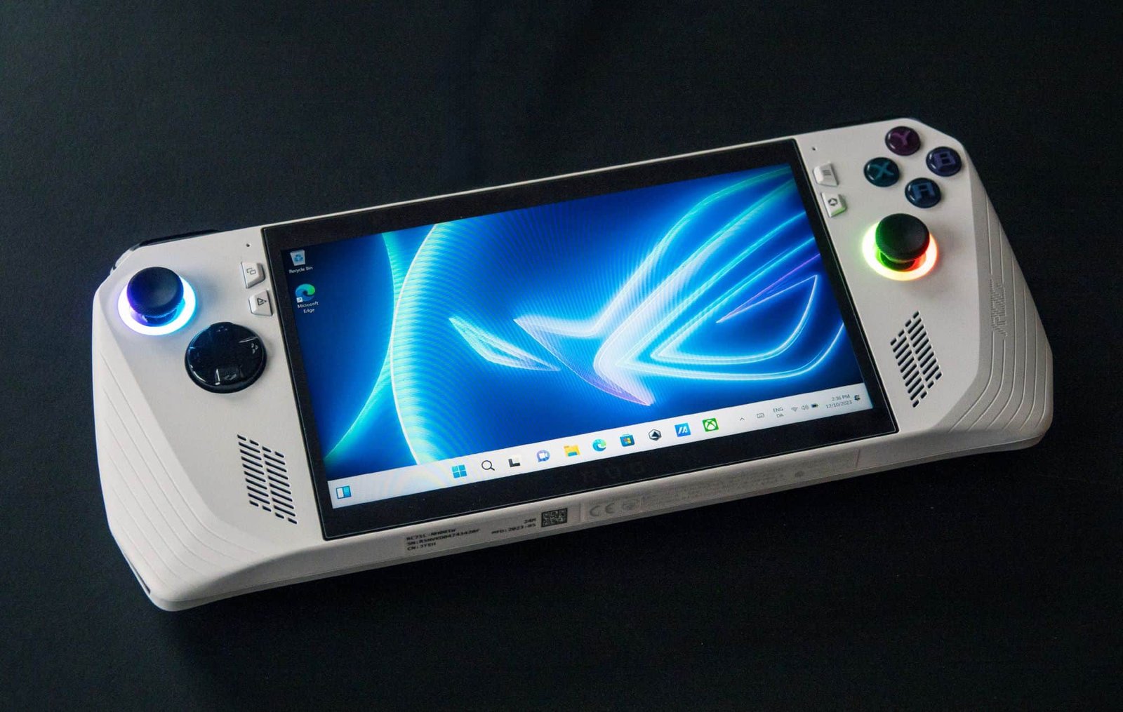 Windows-powered handheld console displaying Xbox-like interface