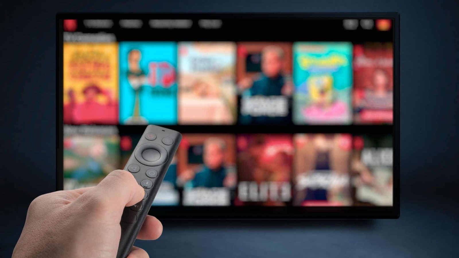 Person pointing a remote at a TV with a streaming app open