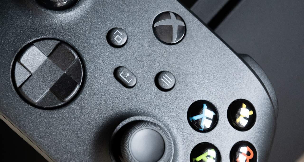 Xbox controller next to gift card codes