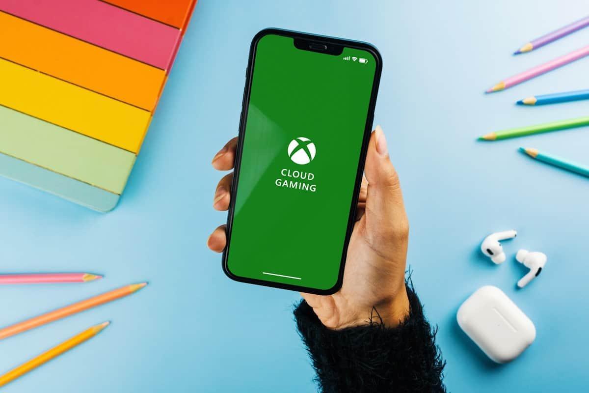 Hands using Xbox Cloud Gaming on a device