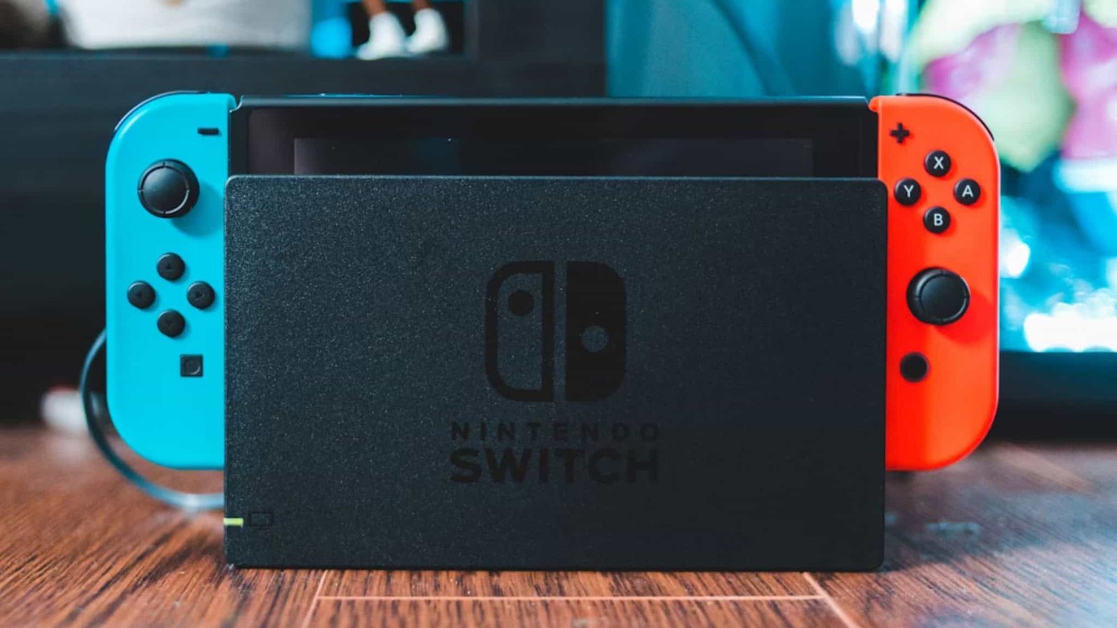 Nintendo Switch console resting on a wooden table