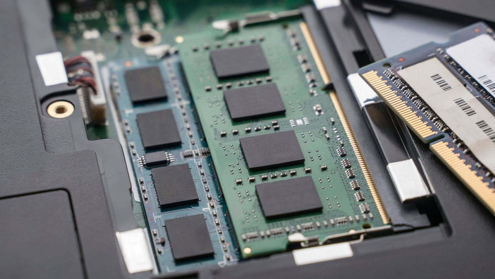 RAM modules installed in a PC motherboard showing memory upgrade and compatibility