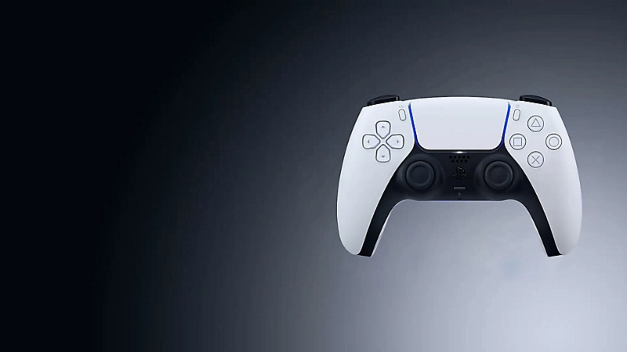 DualSense controller on a console surface