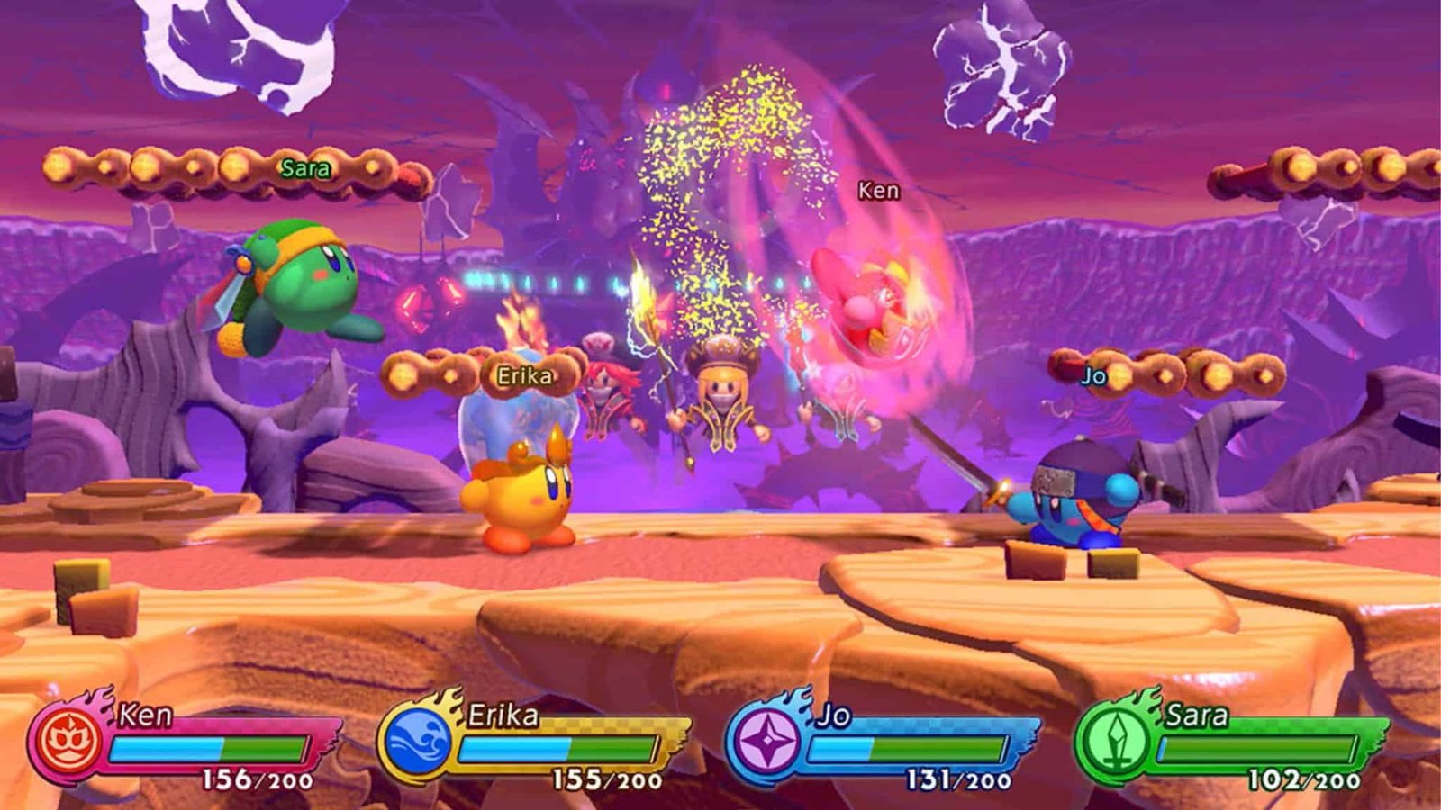 Colorful Kirby characters battling on an interactive stage