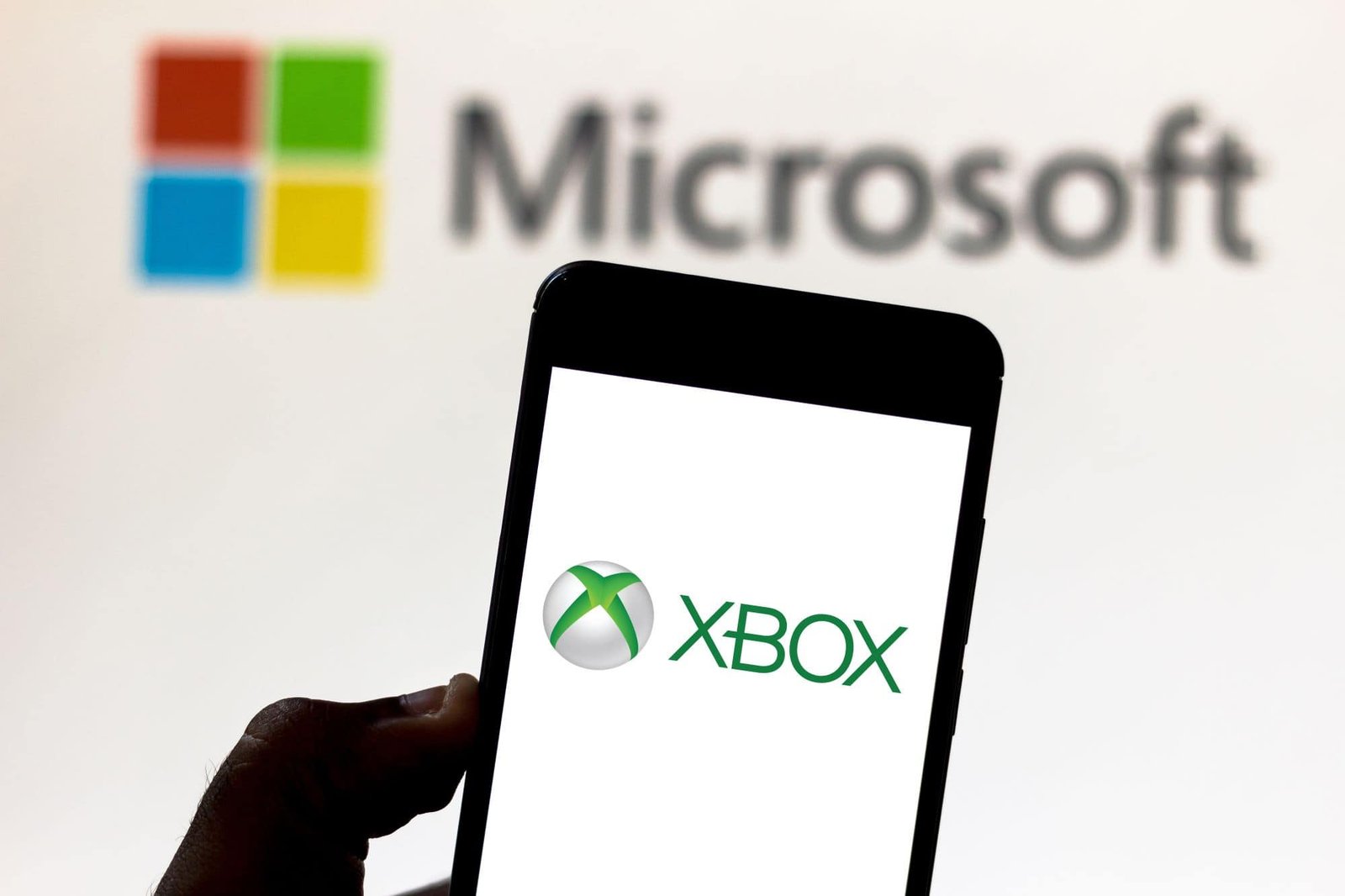 Close-up of Xbox console branding on a textured surface