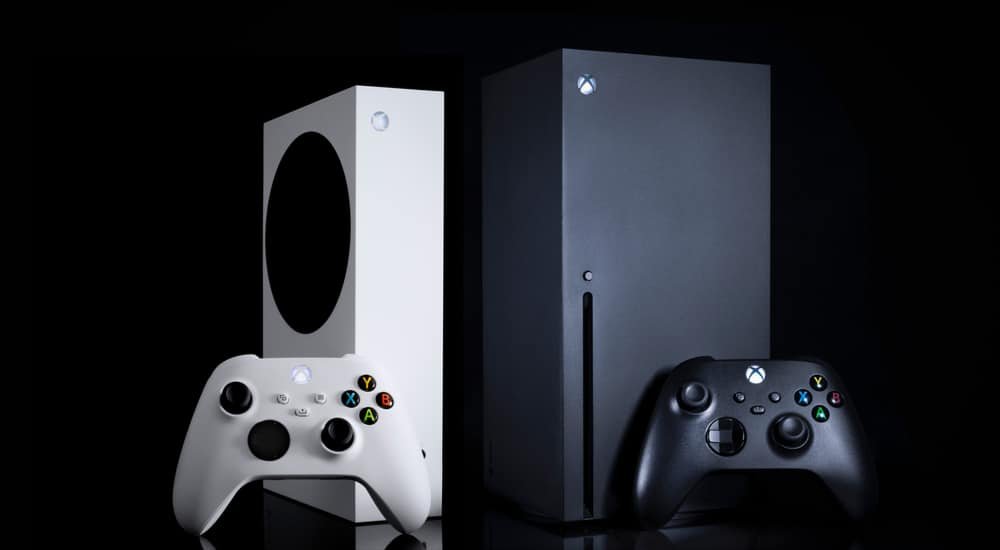 Compact white Xbox Series S console beside an Xbox Series X